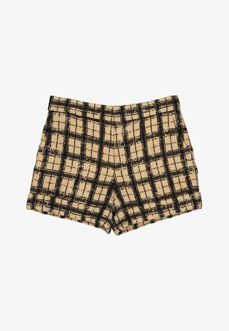 Short en laine beige et noire à carreaux avec jambes retroussées et poches latérales.