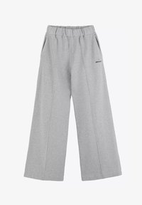 Grijze sweatpants gemaakt van zachte stof, met een wijde pasvorm, elastische tailleband en zijzakken. Minimaal merklogo weergegeven.