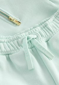 Baker by Ted Baker FRILL SET - REGULAR FIT - Trainingsbroek - mint green