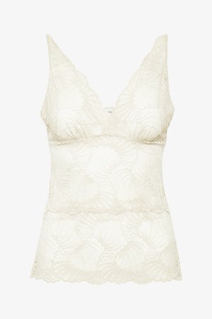 Lace bralette in ivory with V-neckline, floral pattern, scalloped edges, and soft texture. Features a layering design for comfort.