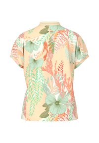 Kurzes T-Shirt aus pfirsichfarbenem Stoff, mit einem lebhaften Blumen- und Blattmuster in Grün, Orange und Pink. Lässiger Schnitt, runder Halsausschnitt.