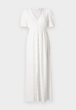 Robe maxi blanche avec un décolleté en V, des manches courtes bouffantes, un bouton devant et un motif de points brodés. Le tissu est léger avec une coupe ample.