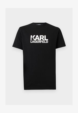 Černé tričko s krátkým rukávem s bílým nápisem "KARL LAGERFELD" a malou grafickou siluetou uvnitř písmene "K" na hrudi.