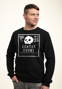 Schwarzer Sweatshirt aus Baumwolle mit einem weißen Totenkopf-Graphic und dem Text "CENTRE COURT RACKET CLUB" in einem rechteckigen Design.