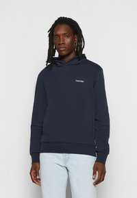 Calvin Klein MICRO LOGO REPREVE HOODIE - Camisola - calvin navy