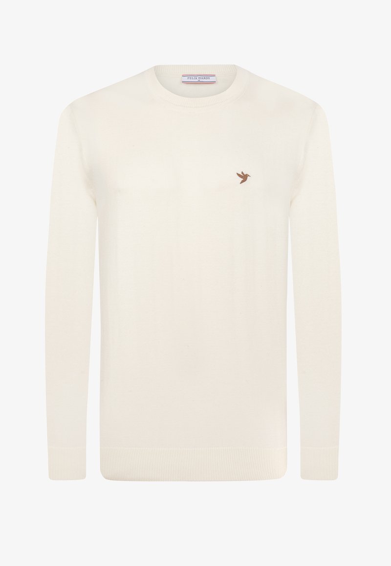 Cremefarbener Pullover aus weichem Material mit rundem Halsausschnitt und langen Ärmeln. Das Design wird durch ein kleines braunes Vogel-Logo auf der Brust ergänzt.