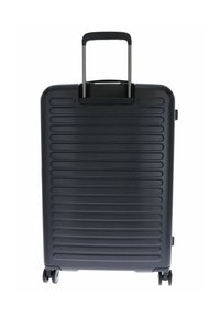 Valise rigide noire avec un design texturé en relief, une poignée extensible et quatre roues pivotantes pour une mobilité optimale. Surface lisse, forme compacte.