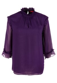 Blusa viola trasparente con un collo alto arricciato, apertura a chiave e maniche a tre quarti con polsini arricciati. Tessuto morbido e leggero.