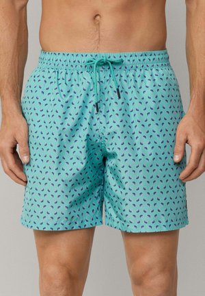 Türkise Badeshorts mit einem elastischen Bund und kontrastierender Kordel. Mit einem wiederholenden kleinen navyfarbenen Blumenmuster über das gesamte Material.