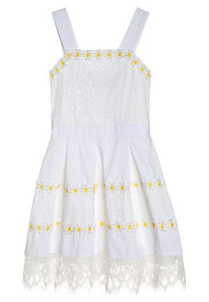 Biała sukienka z koronkową fakturą, żółty haftowany stokrotkami oraz rozkloszowanym dołem. Posiada regulowane ramiączka oraz koronkowe wykończenie na dolnym brzegu.
