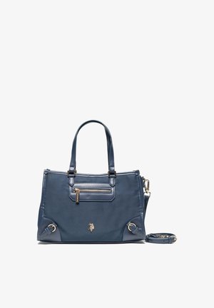 Marineblaue Handtasche mit zwei oberen Griffen, einer vorderen Reißverschlusstasche, goldfarbenen Beschlägen und einem verstellbaren Schulterriemen, der daneben liegt.