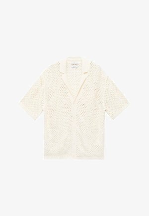 Kortærmet, elfenbensfarvet strik cardigan med et blonder-lignende åbent mønster og en klippet krave. Lukning foran med knapper og afslappet pasform.