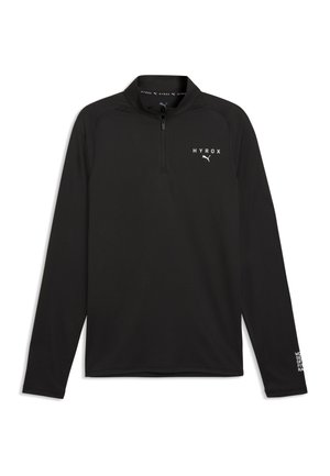 Sort atletisk pullover med lange ærmer og kvart lynlås, med hvide "HYROX" og Puma logoer på brystet og lille tekst på venstre ærme.