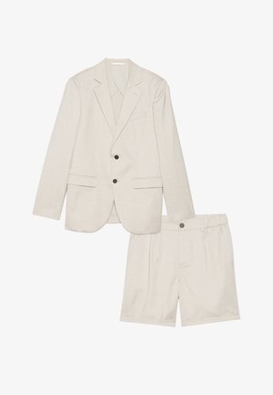 Light beige blazer with two black buttons and matching elastic waist shorts, crafted from textured fabric with a subtle pattern.
