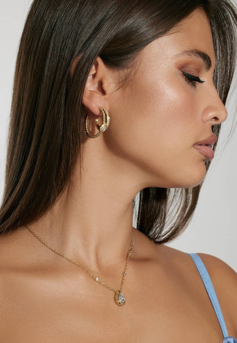 Guess Oorbellen - goldenfarbe