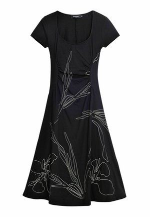 Black dress made of soft fabric with short sleeves, a fitted bodice, and a flared skirt. Features white floral line drawings.