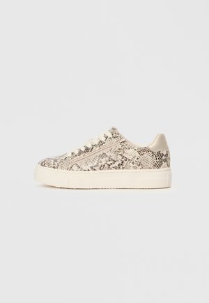White sneakers with a light beige and black snake print pattern, featuring a rounded toe, lace-up front, and minimalistic design.