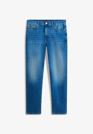 Μπλε τζιν παντελόνι με ξεθωριασμένες περιοχές στους μηρούς, εμπρόσθιο κουμπί και φερμουάρ, θηλιές για ζώνη και σχεδιασμό με πέντε τσέπες.