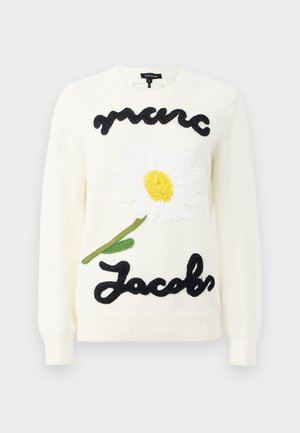 Creme sweater med oversized marguerite broderi i hvid og gul, og "Marc Jacobs" i sort kursiv. Ribbet manchetter og kant.
