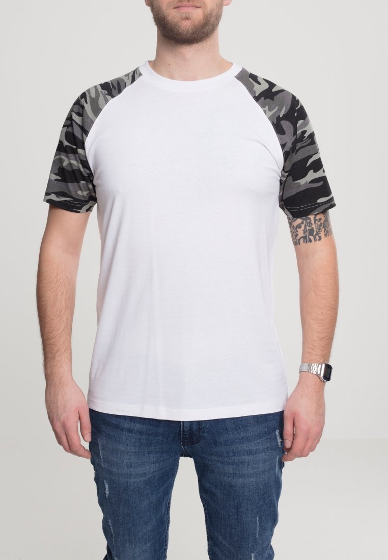 White short-sleeve T-shirt with black and gray camouflage pattern on the sleeves. Crew neck, smooth material, relaxed fit.