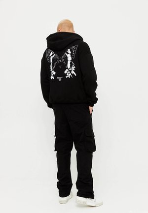 Sweater met rits - black