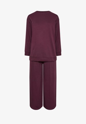 Ensemble de vêtements de détente bourgogne comprenant un haut à manches longues et un pantalon à jambes larges. Tissu en tricot, texture douce, coupe décontractée et poignets côtelés aux manches.