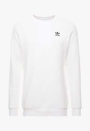 Sweatshirt blanc en mélange de coton, avec un col ras du cou côtelé, des manches raglan longues et un petit logo Adidas noir sur la poitrine.