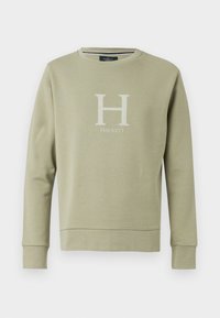 Sudadera verde de manga larga con cuello redondo, que presenta un gran logo blanco con la "H" y el texto "HACKETT" en la parte delantera. Tela de mezcla de algodón.