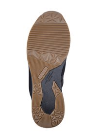 Rubber shoe sole featuring a textured, patterned design with a combination of dark and light brown sections. Marked with brand details.