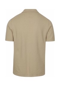 Beige poloshirt met korte mouwen, voorzien van een gestructureerd patroon, klassieke kraag en rechte zoom. Gemaakt van zachte, ademende stof.