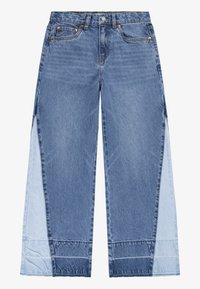 Denim trousers featuring a two-tone design with dark and light blue panels, wide leg shape, classic five-pocket styling, and button closure.