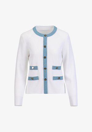 Balta adīta kardigāna ar gaiši zilu apkakli un pogu līniju. Ir divas gaiši zilas kabatas ar metāliskām pogām uzsvērumam.