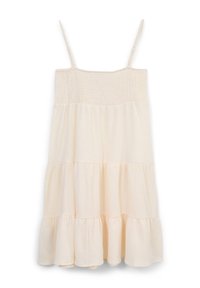 Cream-colored sleeveless dress with a smocked bodice, tiered skirt, and soft textured fabric. Casual A-line silhouette.