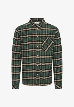 Camicia in flanella verde con motivo a quadri nero e beige, chiusura con bottoni, taschino sul petto e maniche lunghe. Realizzata in tessuto morbido.