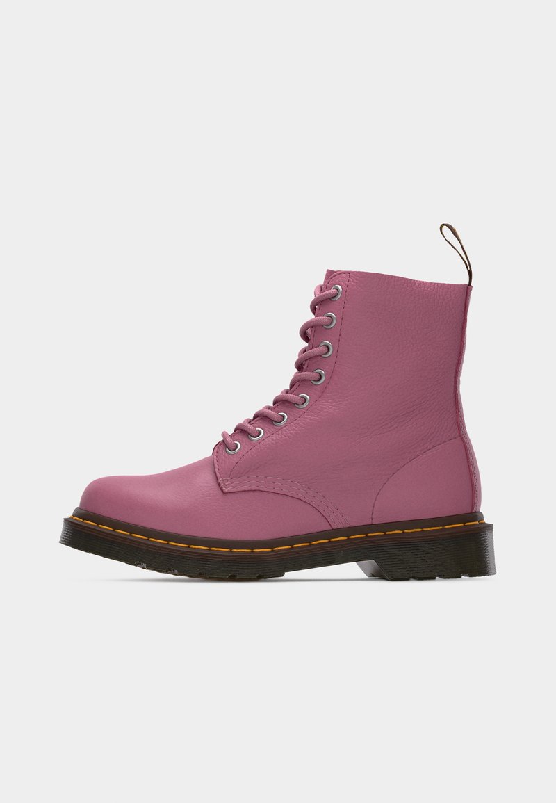 Pink leather lace-up ankle boot with black sole and yellow stitching, featuring a pull tab at the back.