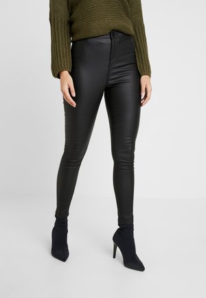 Pantaloni - coated denim