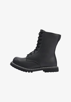 Zwarte veterschoenen met een leren bovenwerk, ronde neus, stevige rubberen zool en witte stiksels langs de rand van de zool.