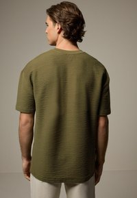 Next REGULAR FIT zielony