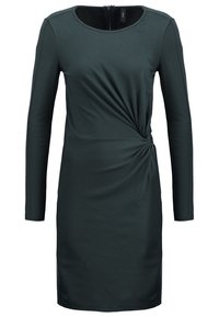 Robe vert foncé en tissu extensible, avec des manches longues, un col rond et un détail en nœud torsadé à la taille.