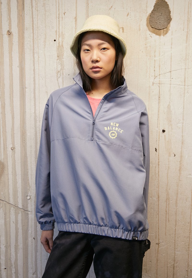 New Balance SPORT LAYER Windbreaker grey/blue Zalando.co.uk