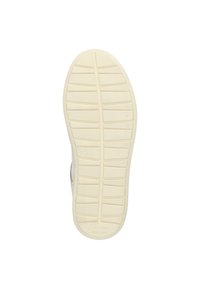 Schuhsohle mit einer strukturierten Gummi-Oberfläche in hellem Cremefarbton, mit gemusterten Rillen und einer Prägung des Logos in der Nähe des Zehenbereichs.