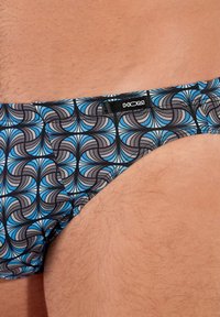 Gemusterte Schwimm-Boxershorts mit geometrischem Design in Schwarz, Blau und Grau. Hergestellt aus einem glatten, dehnbaren Stoff. Logo auf dem Bündchen angebracht.