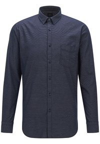 Marinblå skjorta med knappar i en texturerad tyg, som har krage, långa ärmar och ett vänster bröstficka. Knapparna är i matchande marinblå.