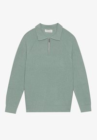 Light green ribbed pullover with a zippered neck, flat collar, and long sleeves. Features textured fabric and a relaxed fit.