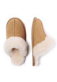 Tan suede slippers with a white fluffy fur cuff, flat sole, and stitching detail along the toe and body. Soft, comfortable design.