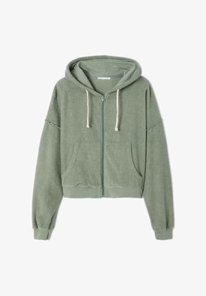 Roheline lühike kapuutsiga pusake pehmest terréadast, millel on kattev lukku, paelkino ja kaks esimest taskut, ning soonikkoesed käised ja alumine äär.