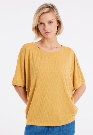 Protest PRTJABA - T-shirt print - tumericyellow