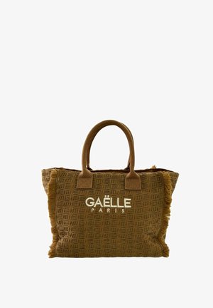 Borsa tote marrone con trama, manici corti e bordi frangiati, con il logo bianco "GAËLE PARIS" centrato sul davanti.