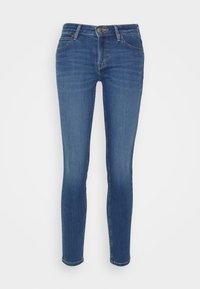 Slim-fit blå denimjeans med medelhög midja, femficksdesign och ljus blekning på låren. Inga synliga mönster eller detaljer.