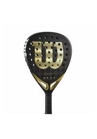 Zwarte paddle met een ronde kop, voorzien van een gouden "W" logo, geperforeerd oppervlak en een textuur handvat. Modelnaam "DEFY PRO" zichtbaar.